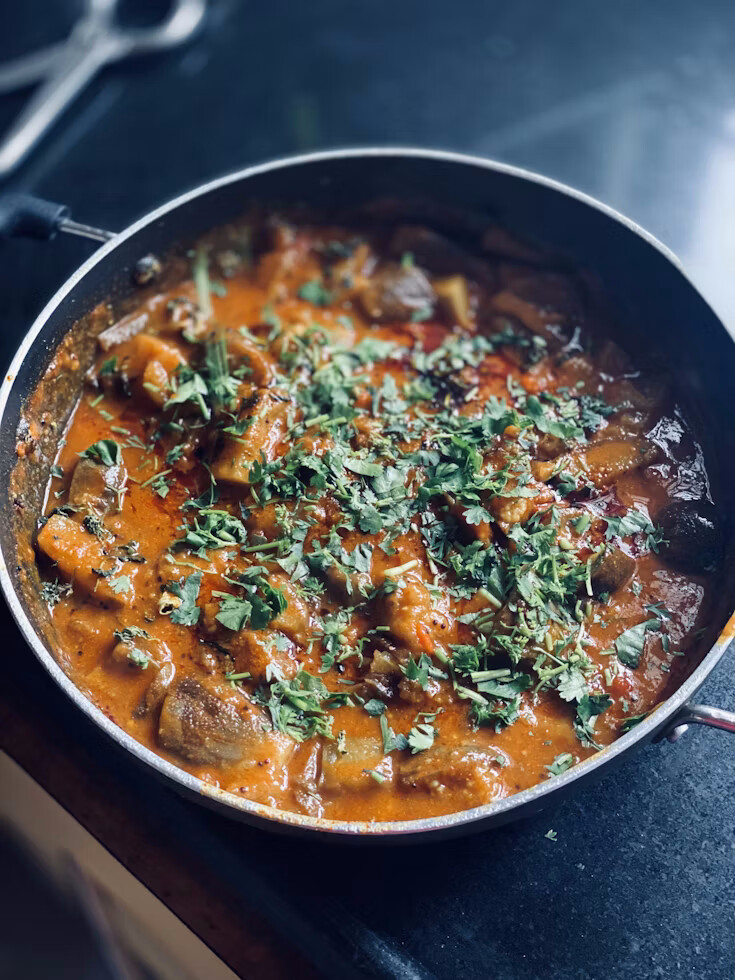 A home-cooked braise in a well-used pan